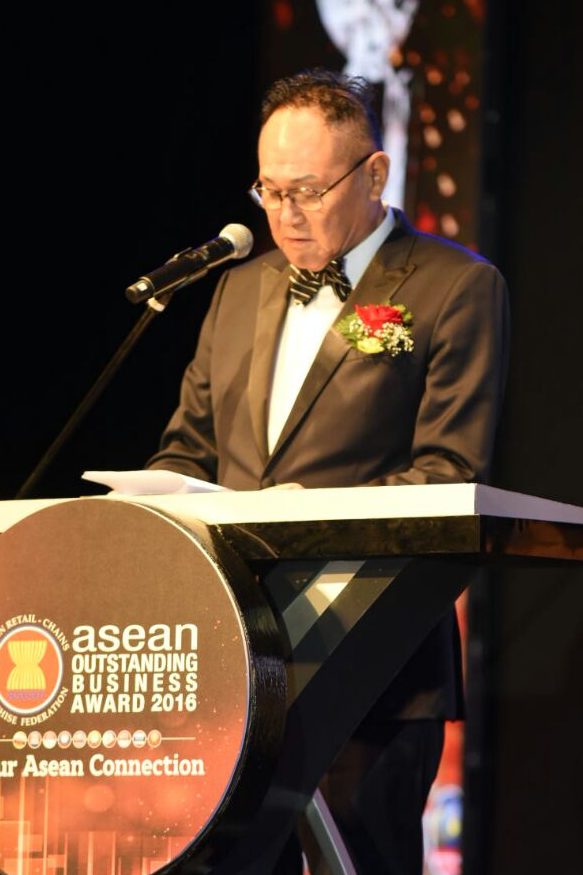 Cecil Chao at a podium